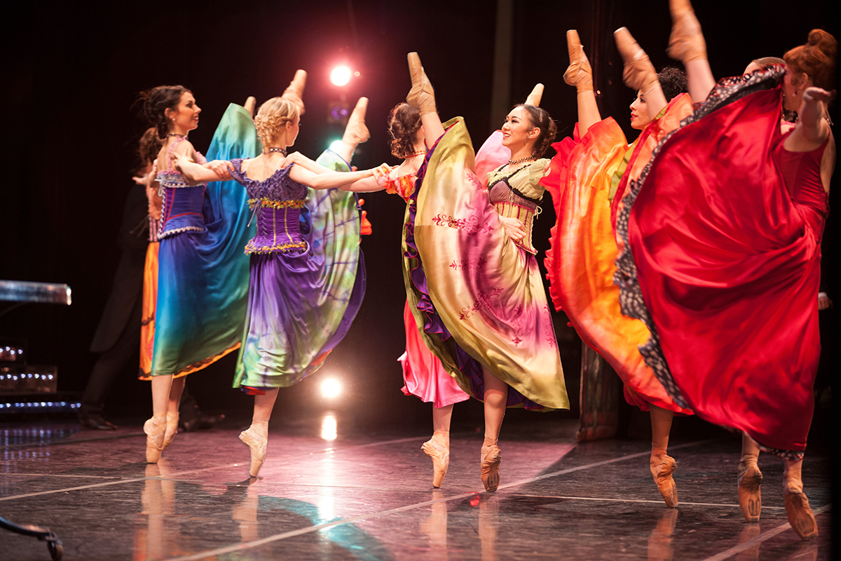 dancers performing Moulin Rouge on stage